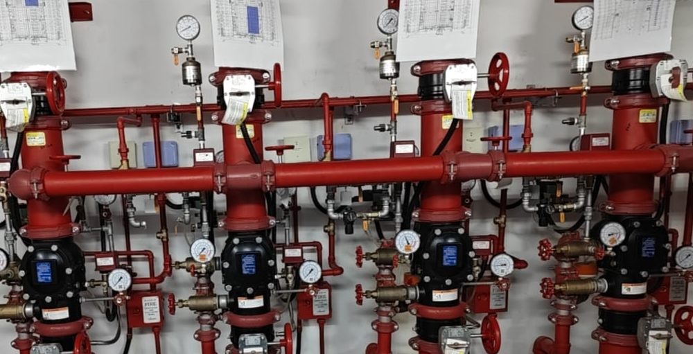 Row of deluge valves with gauges and trim piping