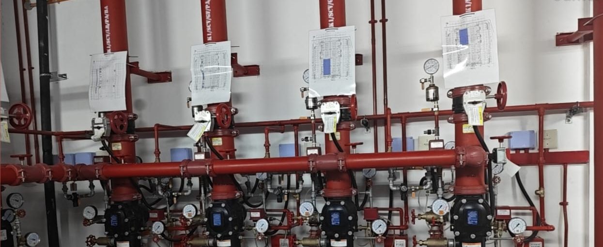 Four deluge valves on a common header with zone drawings above